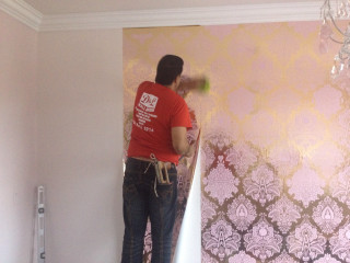 Man painting wall roller brush 3 - action painting free wallpaper