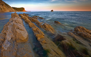 Rock wall ocean sunset bascove - dawn free wallpaper