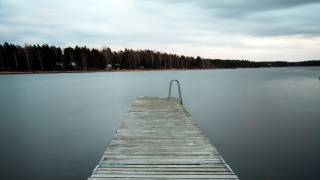 Dock lake boat trees clouds - lake free wallpaper