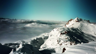 Snowy mountain clouds sky snowboard - a snowboard free wallpaper