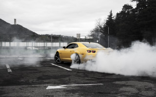 Yellow car smoke parking lot - a yellow car free wallpaper