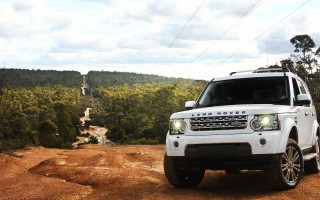 White landrover dirtroad forest hill - a dirt road in front free wallpaper