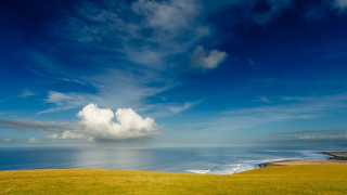 Grassy field bench water beach - david annand free wallpaper
