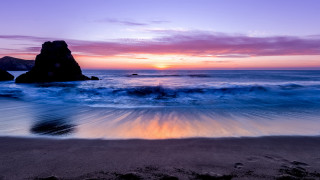 Sunset ocean rock impressionist beach - a sunset over the ocean free wallpaper