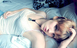 Gothic photorealistic woman bed blonde - pale free wallpaper