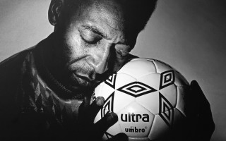 Man holding soccer ball sad 2 - alain tasso free wallpaper