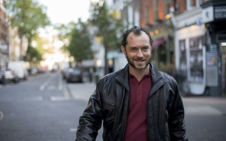 Man smiling leather jacket city - chafik charobim free wallpaper