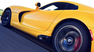Yellow sports car blurry wheels - blurry free wallpaper