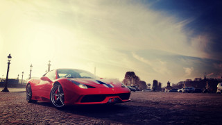 Red sports car cobblestone city - farid mansour free wallpaper