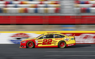 Racecar track blurry stadium red - david park free wallpaper