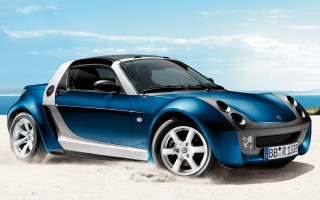 Blue sports car beach ocean - concept design free wallpaper