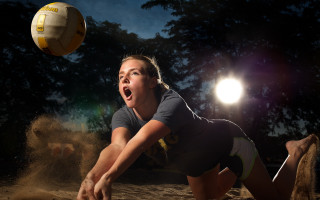 Woman volleyball sand sunshine portrait - behind her free wallpaper