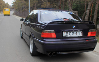 Black car parked road yellow - daryush shokof free wallpaper