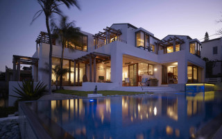 White house pool night lights - a pool in front free wallpaper