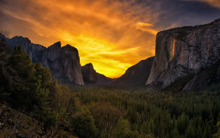Sunset mountains forest cloudy sky - a beautiful sunset over a mountain range free wallpaper