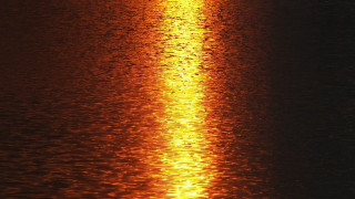 Large water yellow reflection boat - yellow light free wallpaper