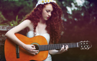 Redhead woman playing guitar outside - elinor proby adams free wallpaper