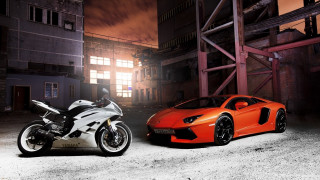 Motorcycles parking lot night building - photorealistic imagery free wallpaper