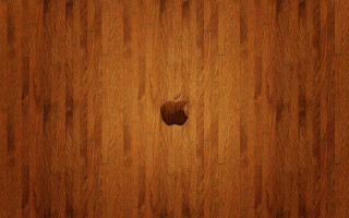 Apple logo wooden surface floor - an apple logo free wallpaper