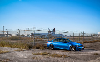 Blue car fence plane outdoors - a blue car free wallpaper