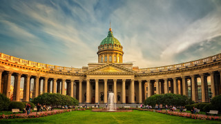 Neoclassical building fountain clouds sunset - a fountain in the middle of it free wallpaper