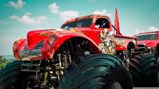 Red truck monster wheels field - monster free wallpaper