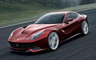 Red sports car driving day - motion free wallpaper