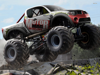 Monster truck jump rocks dirt - a monster truck free wallpaper