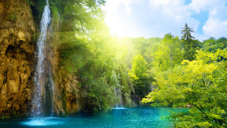 Waterfall forest blue pool green 3 - a waterfall in a forest free wallpaper