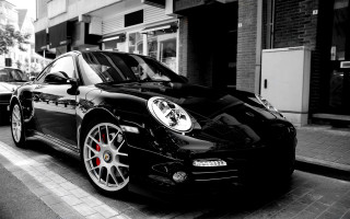 Black porsche street clock building - a black porsche free wallpaper