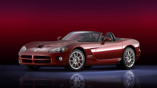 Red sports car studio reflection - a studio photo free wallpaper