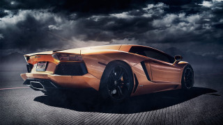 Stormy sky sports car clouds - a sports car free wallpaper