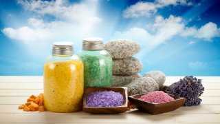 Colorful items table sky clouds - product photography free wallpaper
