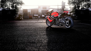 Red motorcycle parking lot fence 3 - a chain link fence free wallpaper