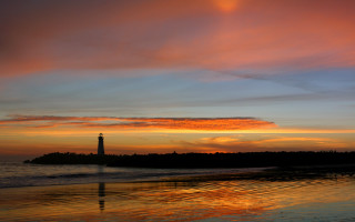 Lighthouse sunset ocean island portrait - the far side free wallpaper