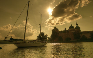 Sailboat castle water sunset sky - a sailboat free wallpaper