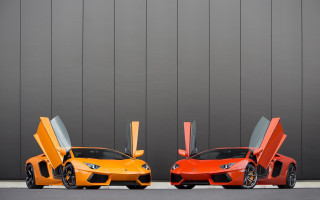 Orange sports cars symmetry puzzle - door free wallpaper