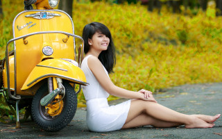 Woman sitting yellow scooter autumn - ding yunpeng free wallpaper