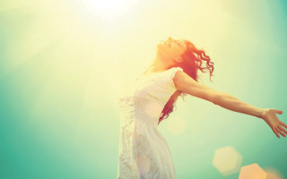 Woman sky reaching sunlight redhair - the sun shining behind her free wallpaper