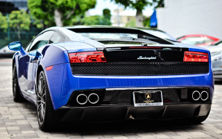 Blue sports car brick street - a few car free wallpaper