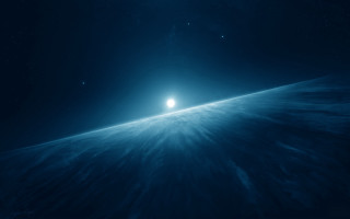 Bright blue space light moon - a bright light in the middle of it free wallpaper