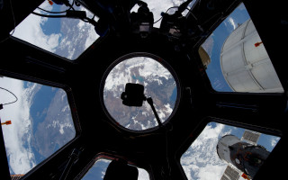 Earth view space station window - a view of the earth free wallpaper