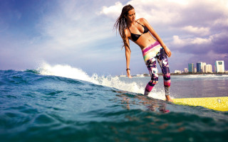 Woman surfboard ocean city summer - in the ocean free wallpaper
