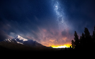 Night sky mountains trees orange - orange glow free wallpaper