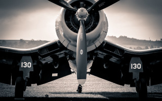 Propeller plane field forest clouds - a propeller plane free wallpaper