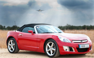 Red sports car field plane - a plane free wallpaper