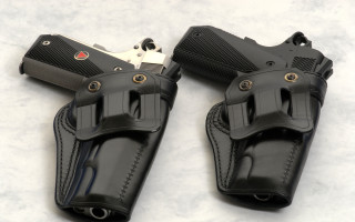 Black holsters silver metal cobra - a white surface free wallpaper