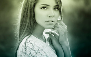 Woman longhair smoking serious portrait - a cigarette free wallpaper