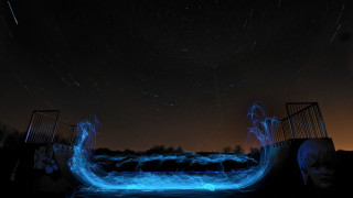 Blue light painting boat night - bruce munro free wallpaper