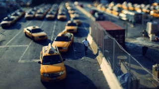 Yellow taxis parking lot tilt - tilt shift free wallpaper